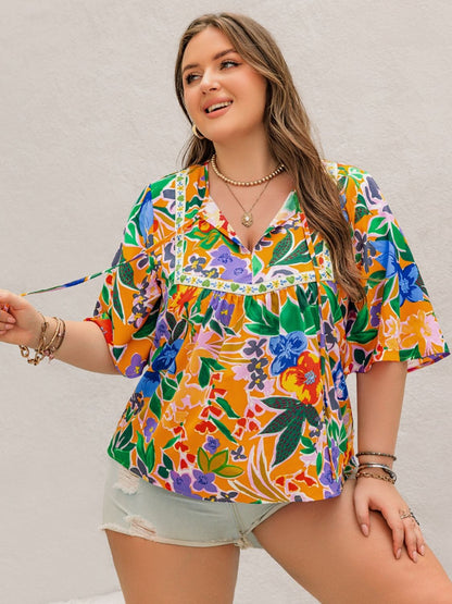 Plus Size Printed Tie Neck Half Sleeve Blouse