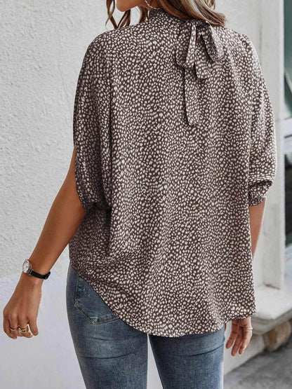 Tied Printed Mock Neck Half Sleeve Blouse